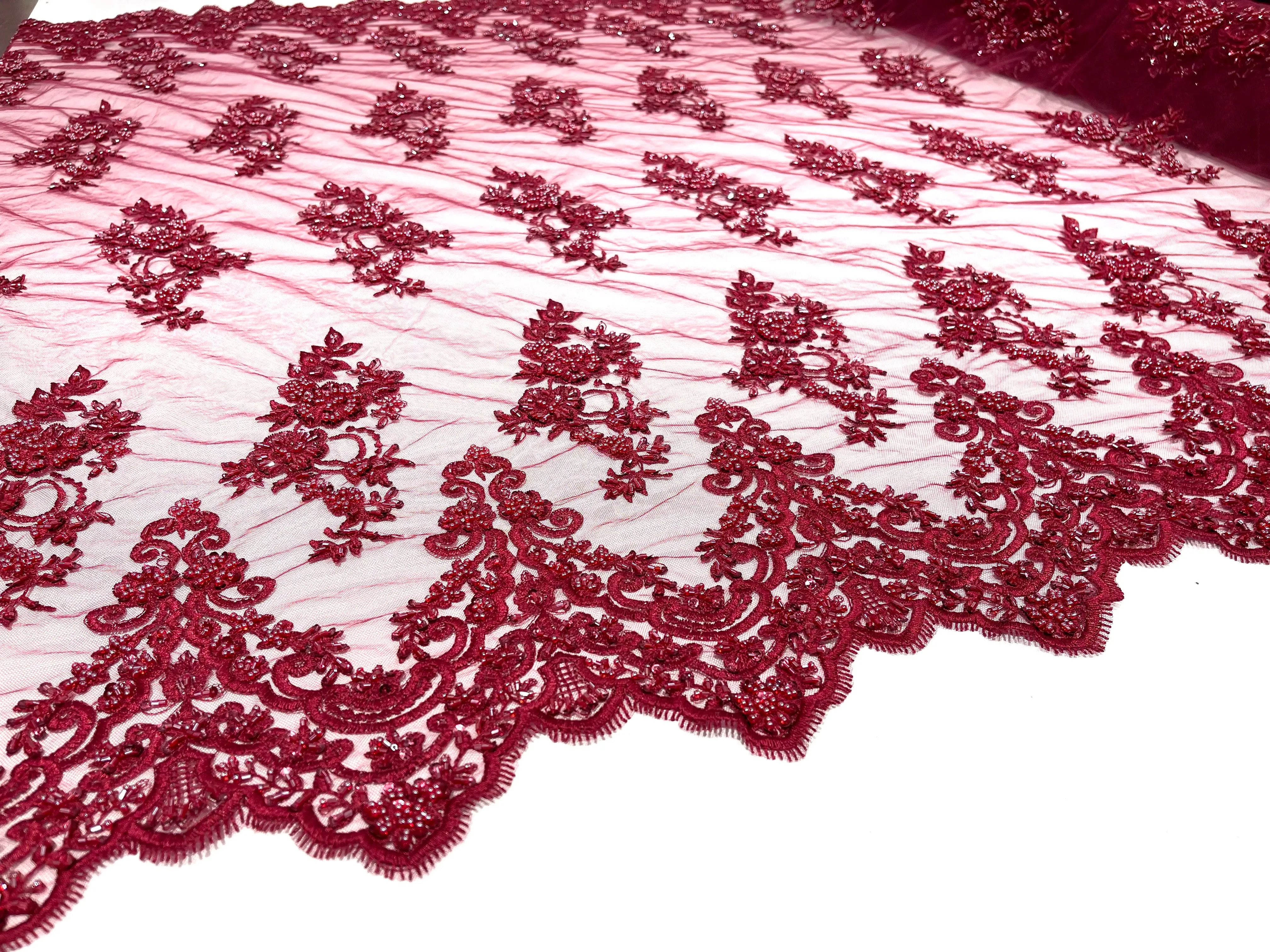 Burgundy elegant hand beaded flower design embroider on a mesh lace-prom-sold by the yard.