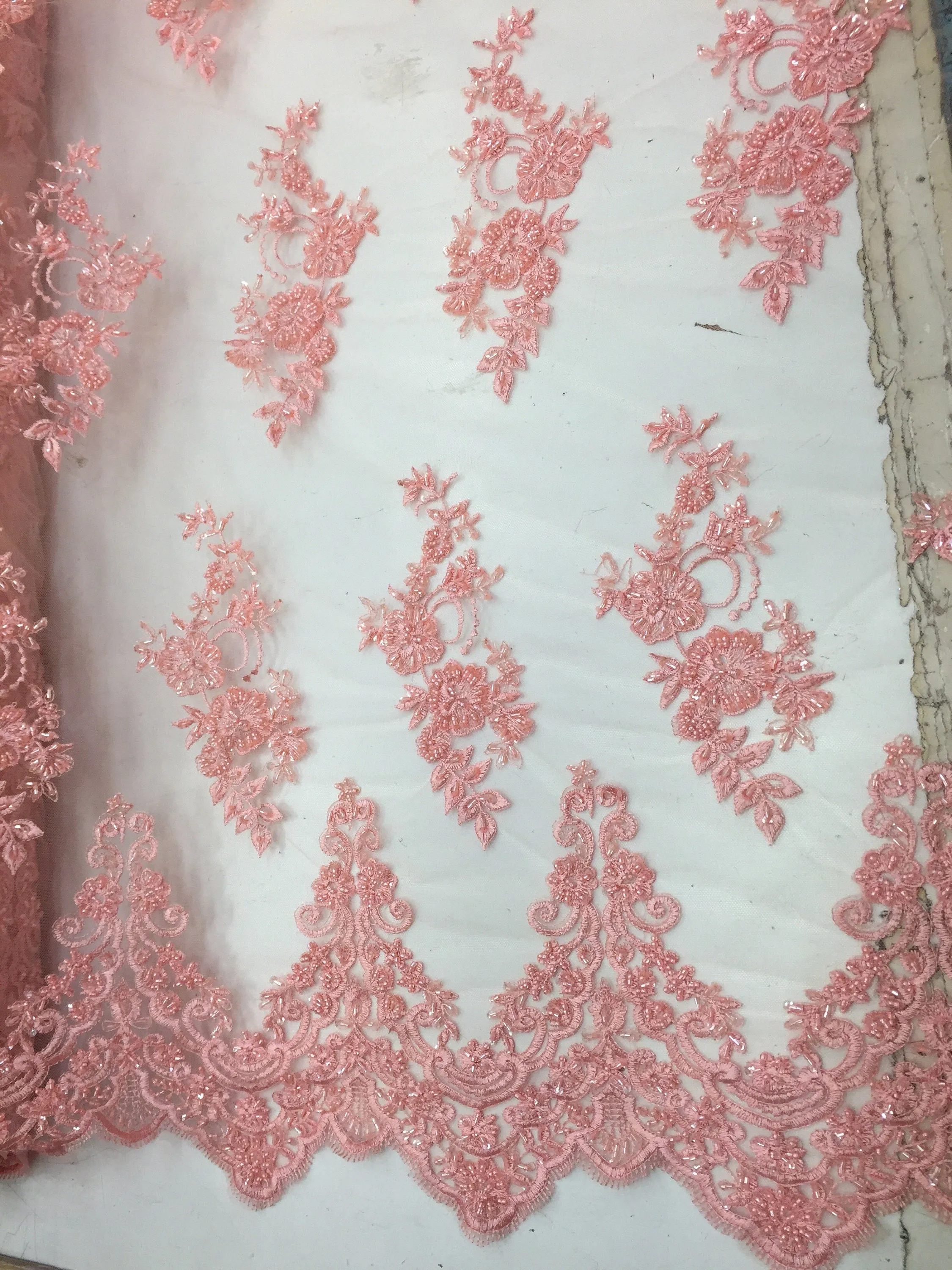 Elegant light peach hand beaded flower design embroider on a mesh lace-prom-nightgown-wedding-bridal-sold by the yard.